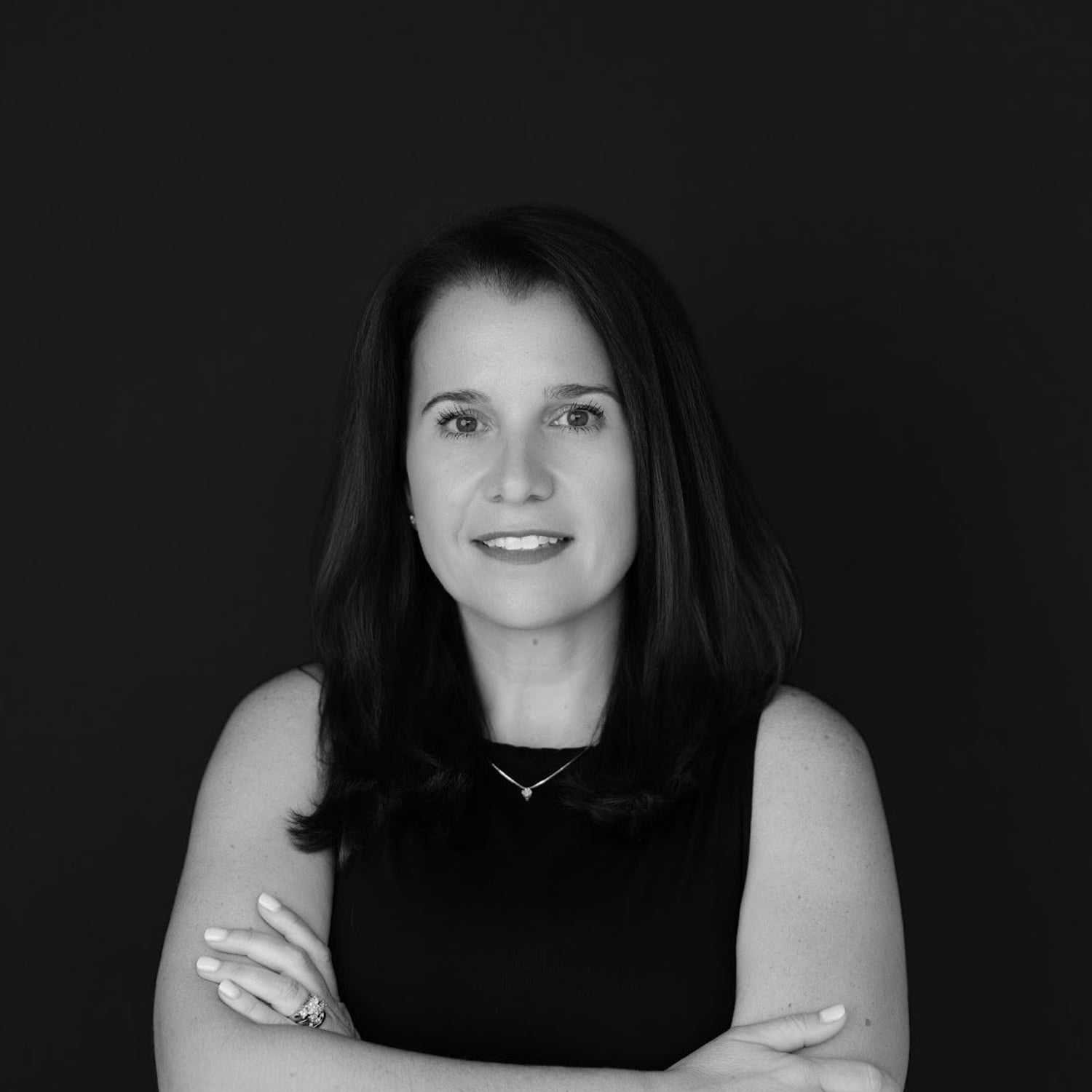 Portrait of Jamie, a professional stylist at Indigo, showcasing their expertise and style.