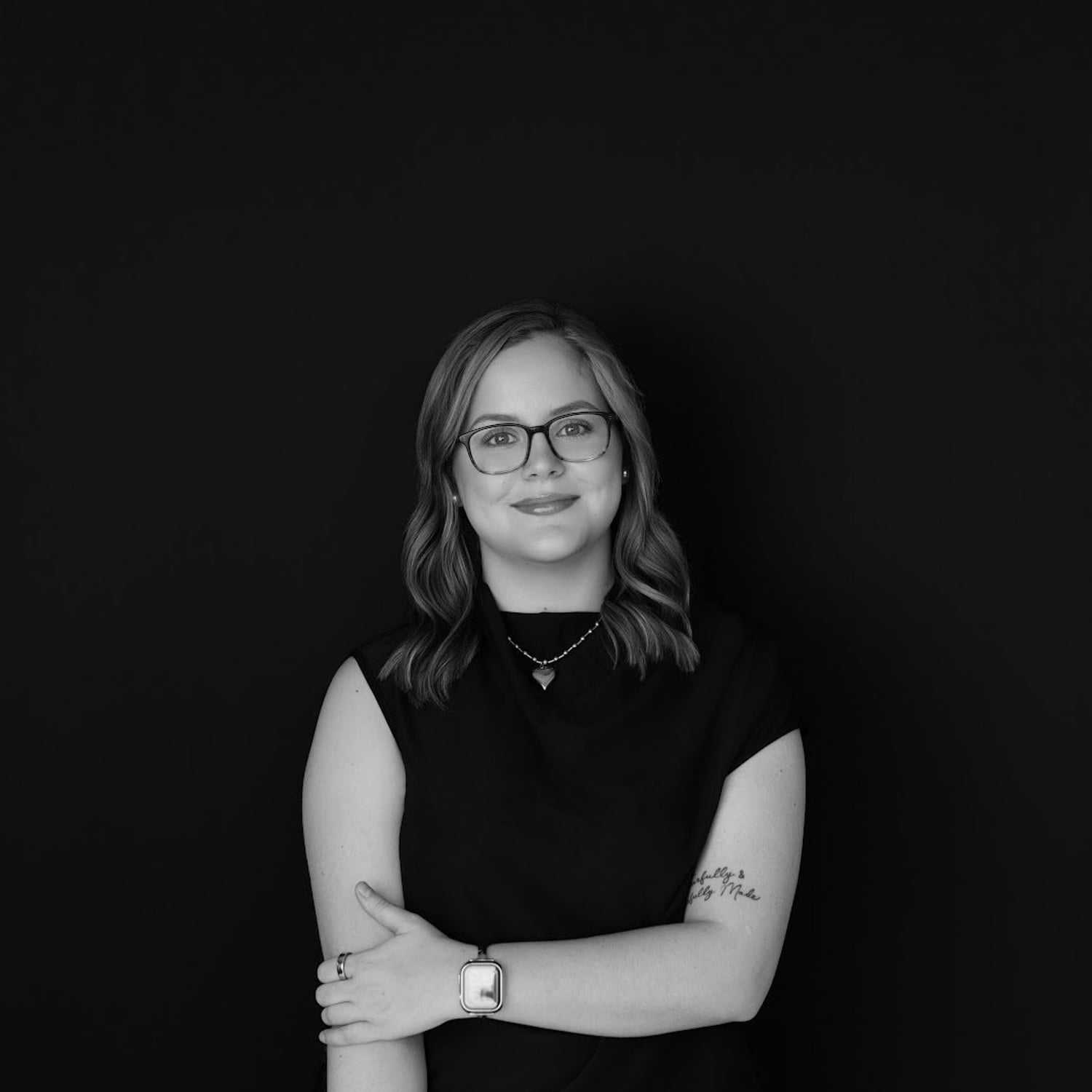 Portrait of Allyson Geddings, a professional stylist at Indigo, showcasing their expertise and style.
